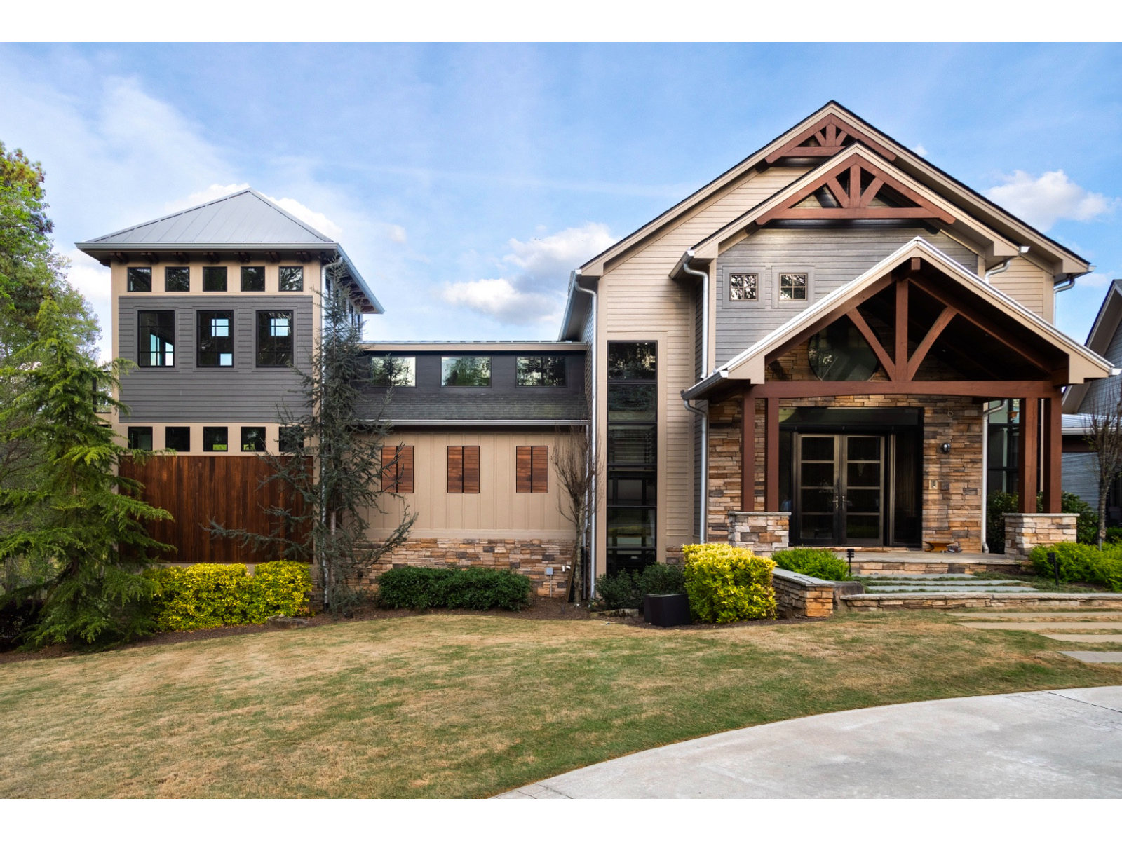 Gunnin Master Bath project in Alpharetta, GA by All-Square Contracting — exterior of the craftsman style home with stone and timber entry